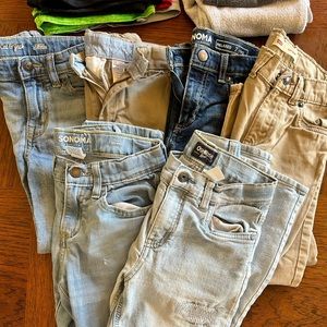 Boys size 7 pants , 5 jeans, one pair khaki slacks, one pair sweat pants